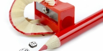 red pencil and pencil sharpener