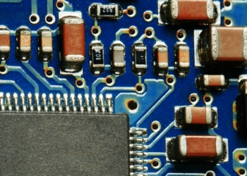 Electronic circuit board with processor, close up.