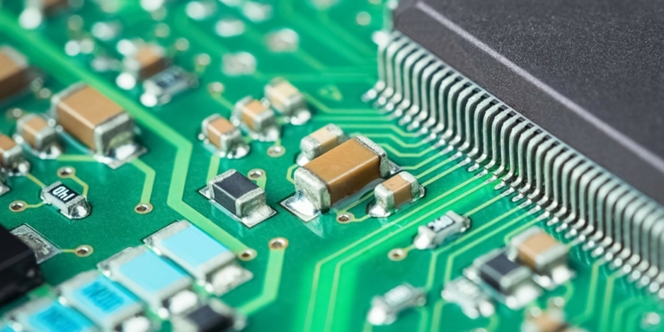 electronic board closeup , microelectronics and semiconductors industry background