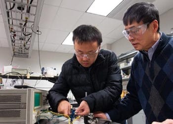Xin Chen, a doctorate candidate in the Department of Materials Sciences and Engineering at Penn State, and Qiming Zhang, distinguished professor of electrical engineering, test a film capacitor.
IMAGE: Penn State College of Engineering
