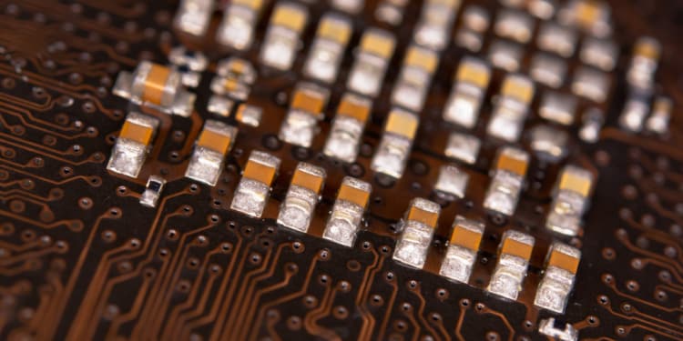 close up ceramic capacitors on electronic circuit board