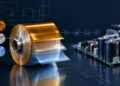 Metallized film capacitor winding with PEN, PET and polypropylene dielectric film layers shown in a power-electronics supply-chain concept