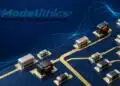 Conceptual illustration for Modelithics COMPLETE 26.5 showing RF capacitors, inductors and resistors on a microwave PCB.