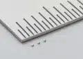 Conceptual illustration of a Murata NCU01 surface-mount NTC thermistor beside densely arranged electronic components