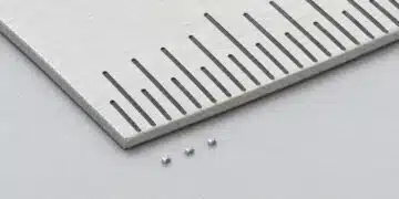 Conceptual illustration of a Murata NCU01 surface-mount NTC thermistor beside densely arranged electronic components