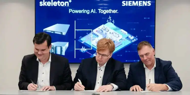 Siemens executives Markus Grabmeier and Barry Powell with Skeleton Technologies CEO Taavi Madiberk at the investment announcement